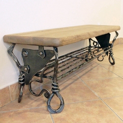 Artistic shoe rack in a family house hall - wrought iron furniture