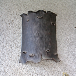 A side wrought iron light