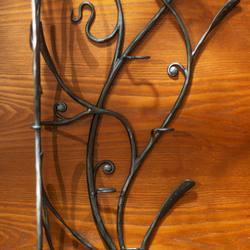 A hand wrought iron hanger - artistic furniture