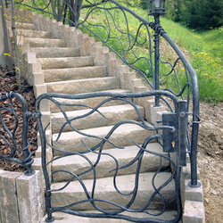 A hand wrought iron gate - a exclusive gate