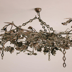 A hand wrought iron chandelier inspired by nature - Oak