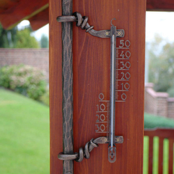A wrought iron thermometer