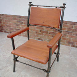 A wrought iron chair - A luxury chair