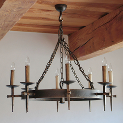 Historical hanging lighting hand-forged for a manor house – indoor chandelier with an imitation of candles