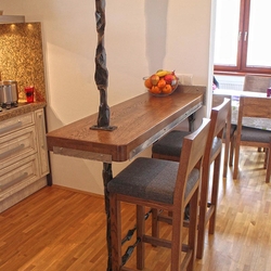 A wrought iron frame for a kitchen bar counter
