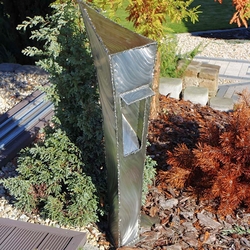 A stainless steel garden lamp - futurism