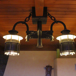 Wrought iron lighting in a summer house - luxury lights