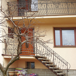 A wrought iron railing - family house