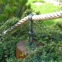 A wrought iron rope holder
