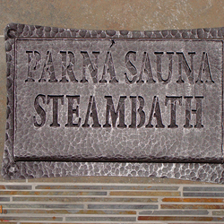 A wrought iron sauna sign