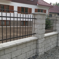 Forged fencing of a family home in simple modern style