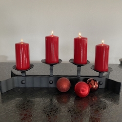 A designer Advent candle holder forged in Atelier of Artistic Smithcraft – UKOVMI