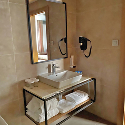 Bathroom set – a shelf and a mirror in modern design made in UKOVMI for hotel Bellevue
