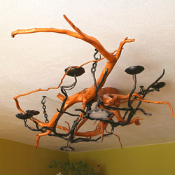 A wrought iron chandelier - An interior light