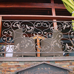 A wrought iron railing 