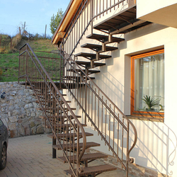 Staircase and railing on a family house - exterior railing for stairs