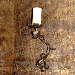 A wrought iron wall candleholder - Vine